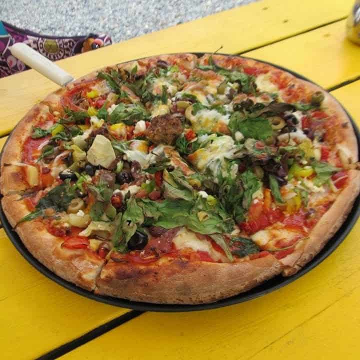 mountain high pizza pie with 30 toppings