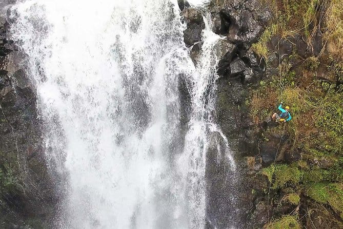waterfall rappelling at kulaniapia falls on of big island waterfalls