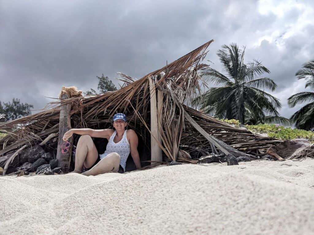 a robinson crusoe type palm shelter at makalawena beach