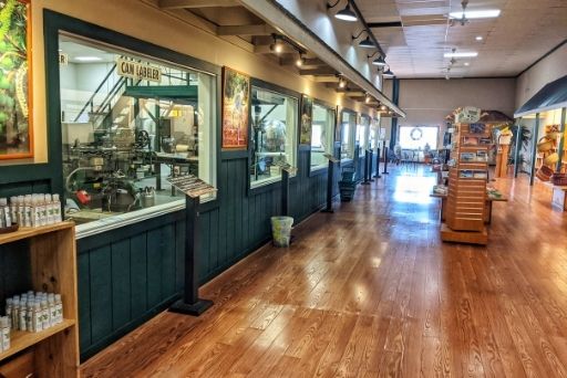 visit a macadamia nut big island factory and watch through the windows as they process the products