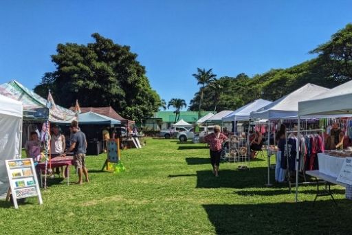 row of vendors at okk market in naalehu