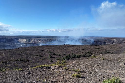 Smoking Kilauea Crater with blue sky