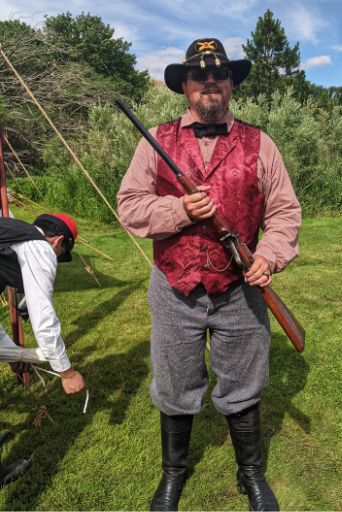 artillery soldier giving gun demonstrations at civil war reenactment yakima