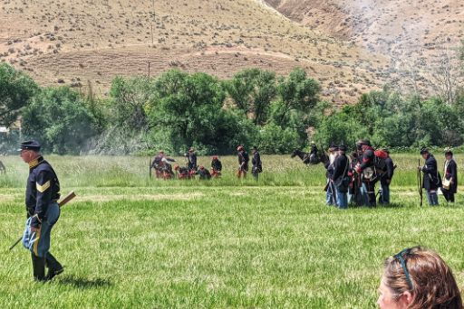 field of soldiers fighting battle at civil war reenactment yakima