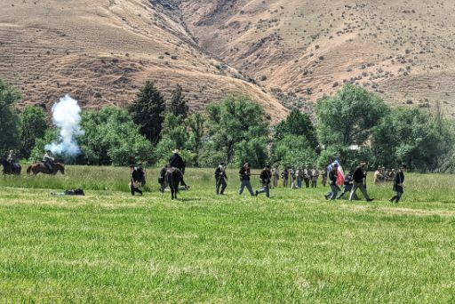 cavalry and infantry fighting during battle at civil war reenactment yakima