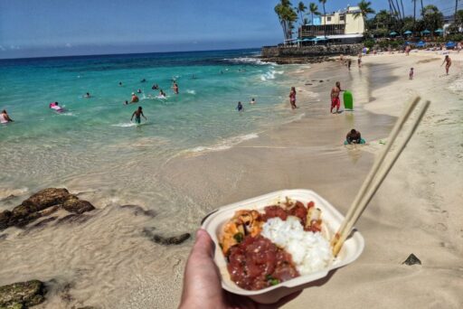 eating da poke shack on magic sands beach