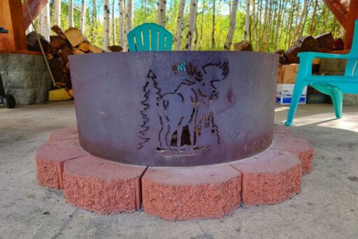 moose engraved firepit at the best Cabins for Rent in Wasilla