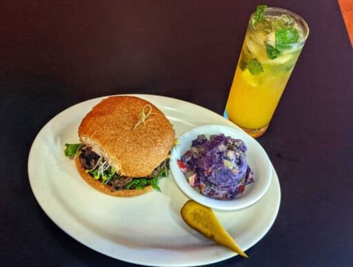 the booch burger with purple sweet potato salad and kombucha cocktail