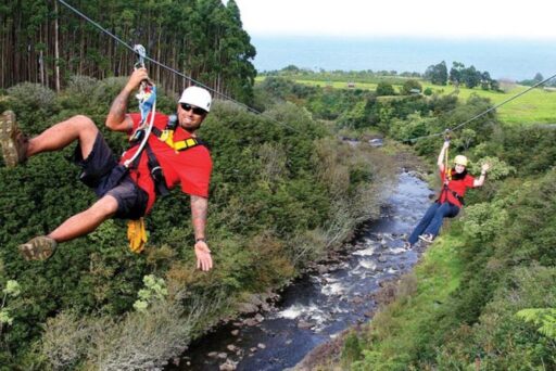 ziplining over waterfall and river