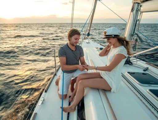 proposing on the water on a sail boat at sunset, a Big Island proposal idea