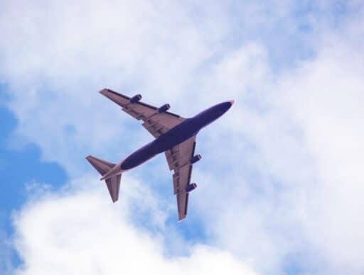 airplane silhouette. flying is an alternative mode of transportation instead of a ferry from oahu to big island