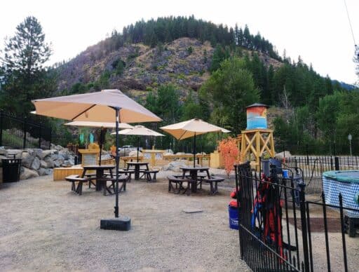 Leavenworth Adventure Park picnic area with mining sluice in background