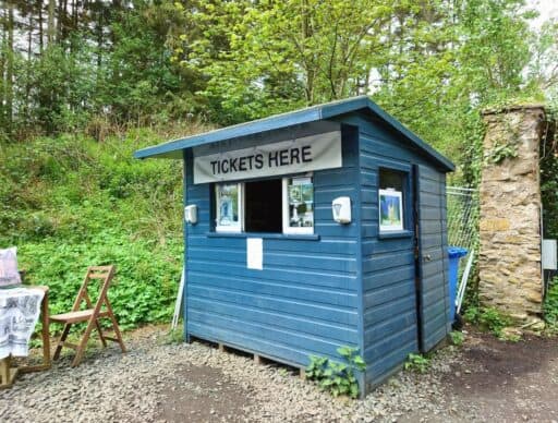 blue ticket booth to purchase entrance tickets to lallybroch