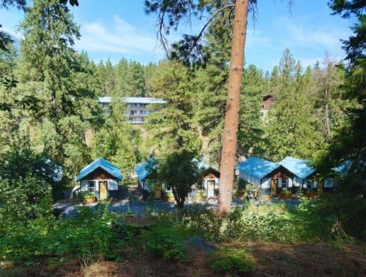 view of LOGE Leavenworth Riverside cabins from the road above