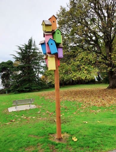 colorful birdhouses marking the way to the northwest trolls
