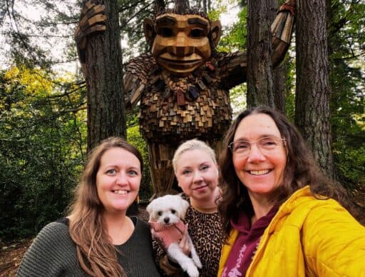 selfie of all of us in front of jakob two trees northwest troll