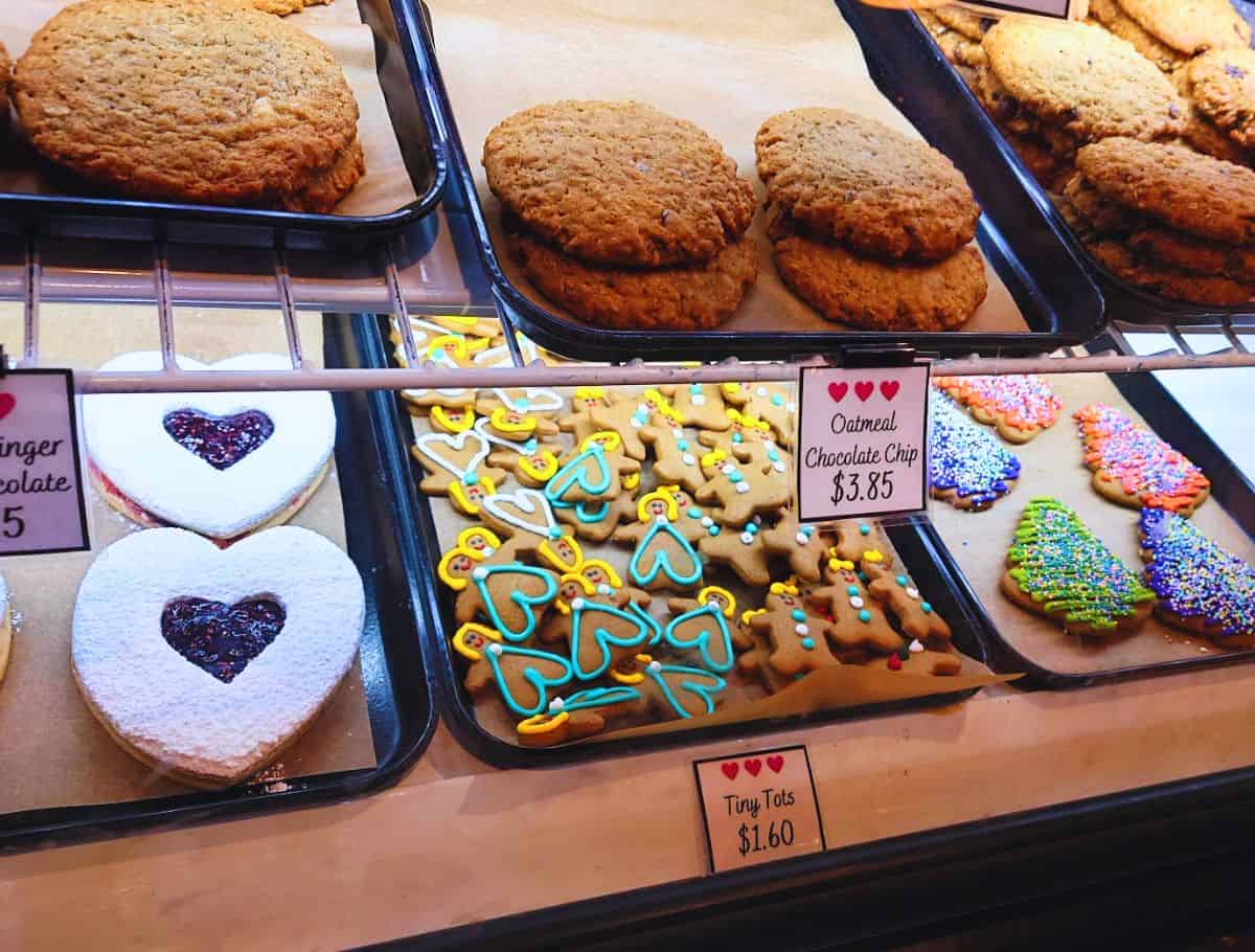 display of Gingerbread treats at the Gingerbread Factory, gingerbread men, jam centered, tree shaped, and oatmeal cookies