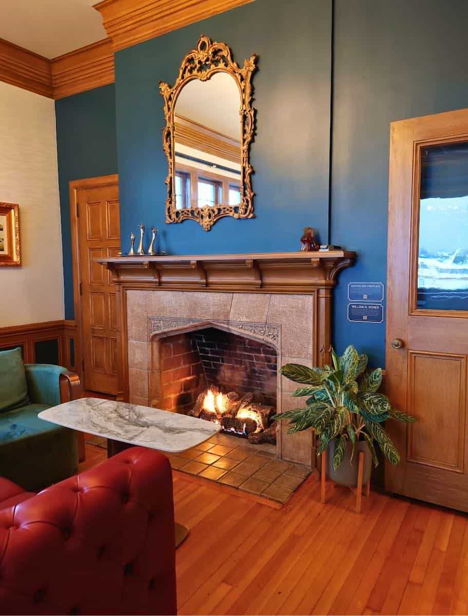 fireplace and ornate guilded mirror
