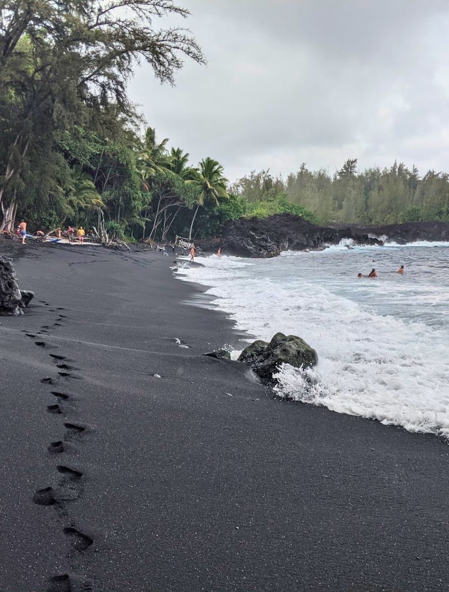 black sand beach on big island known for nudists