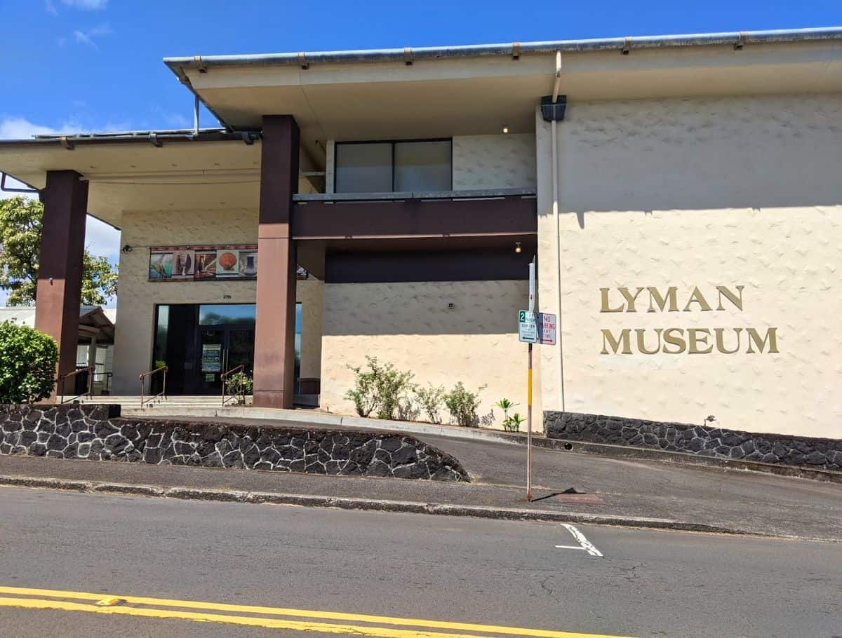 Exterior of the Lyman Museum under a clear blue sky, an educational stop to learn about the Big Island's natural and cultural history