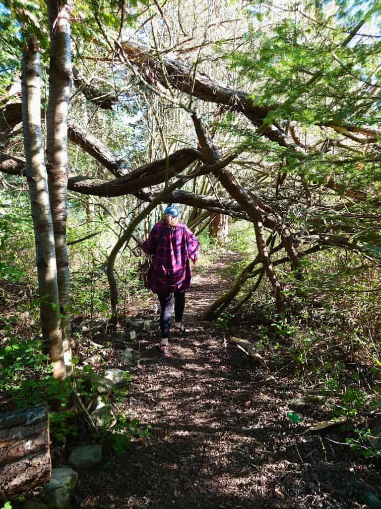 my friend Walking through the quaint trail to Channel View Dr beach