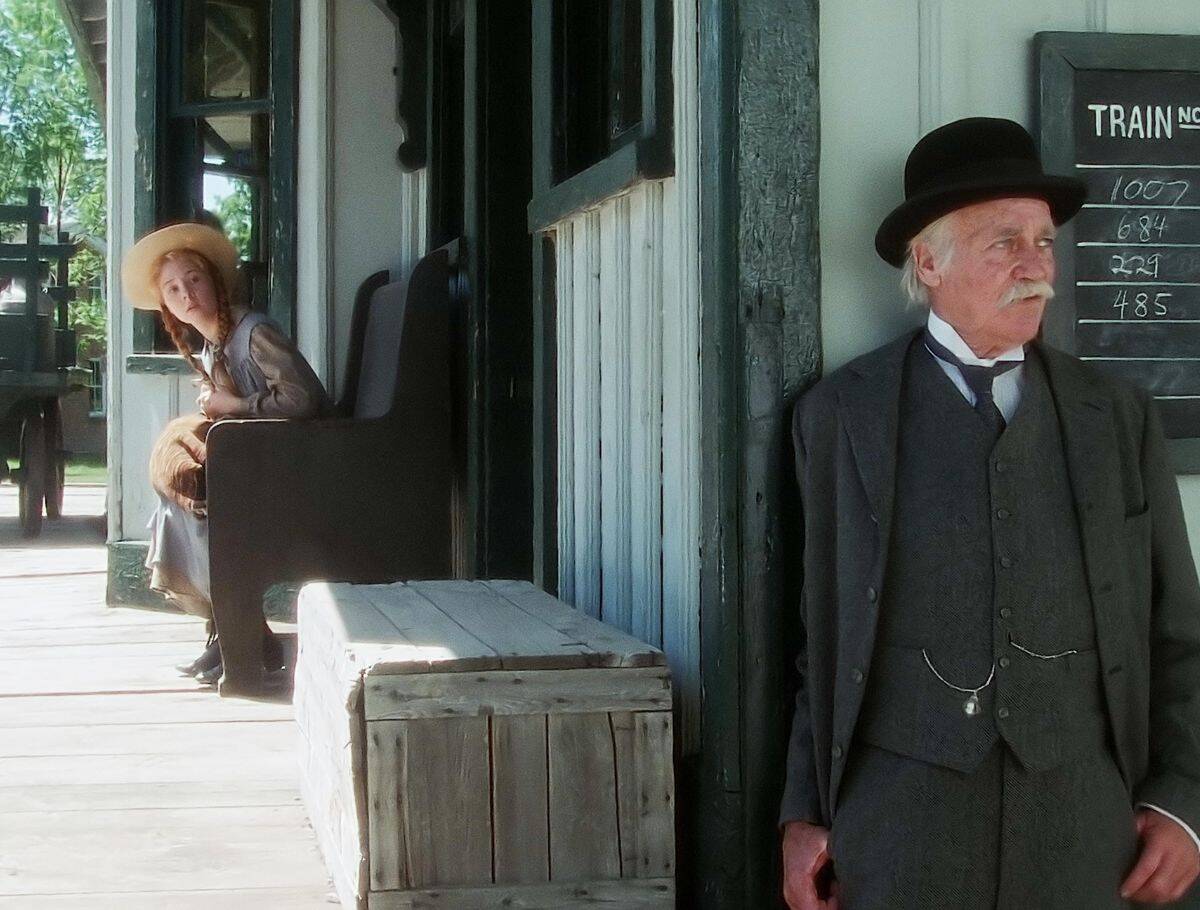 Scene of Anne waiting for Matthew at train station from Anne of Green Gables