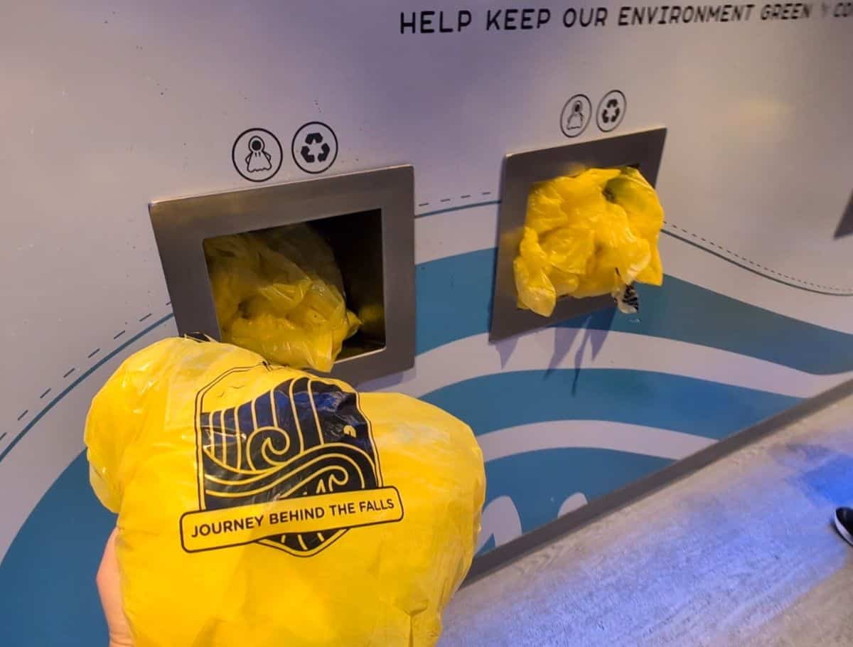 Recycling my yellow poncho into the bin with other yellow ponchos