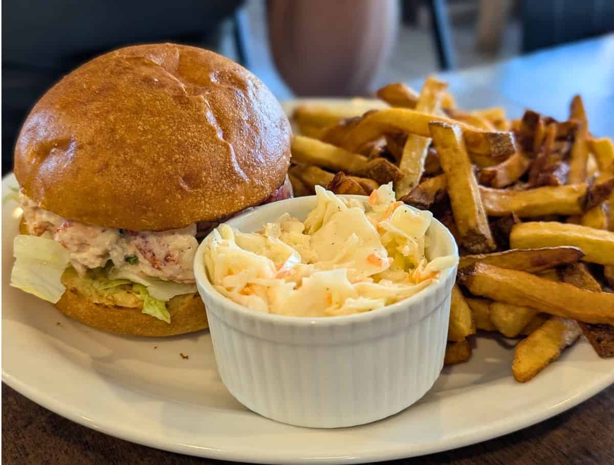 Lobster roll from Captain's Cove Cafe with coleslaw and fries