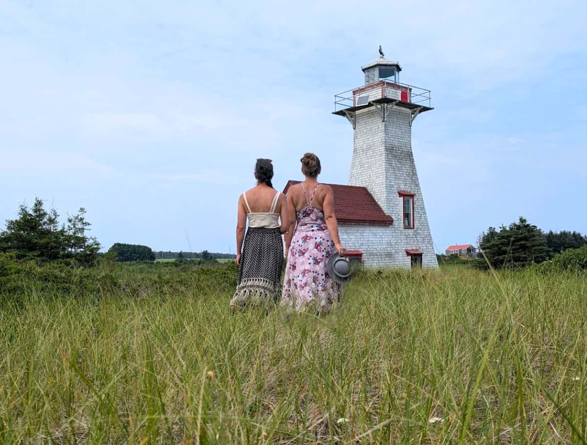 Sara & I at New London Lighthouse posing with backs to camera