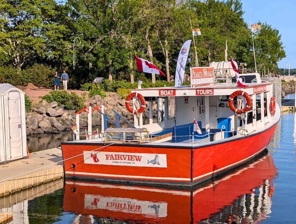 Peake's Wharf boat tours out of Charlottetown; red boat in dock