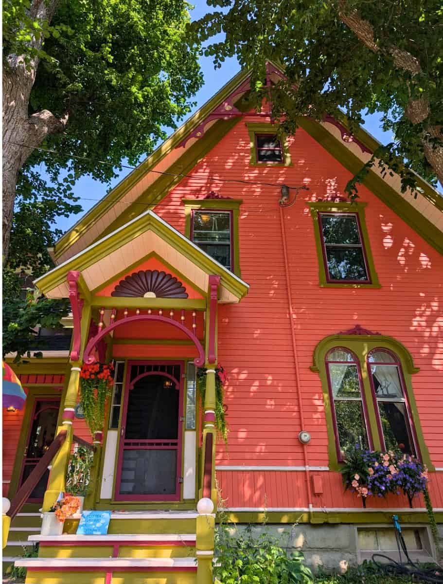 looking up at a Victoria house, multicolored and multidesigns