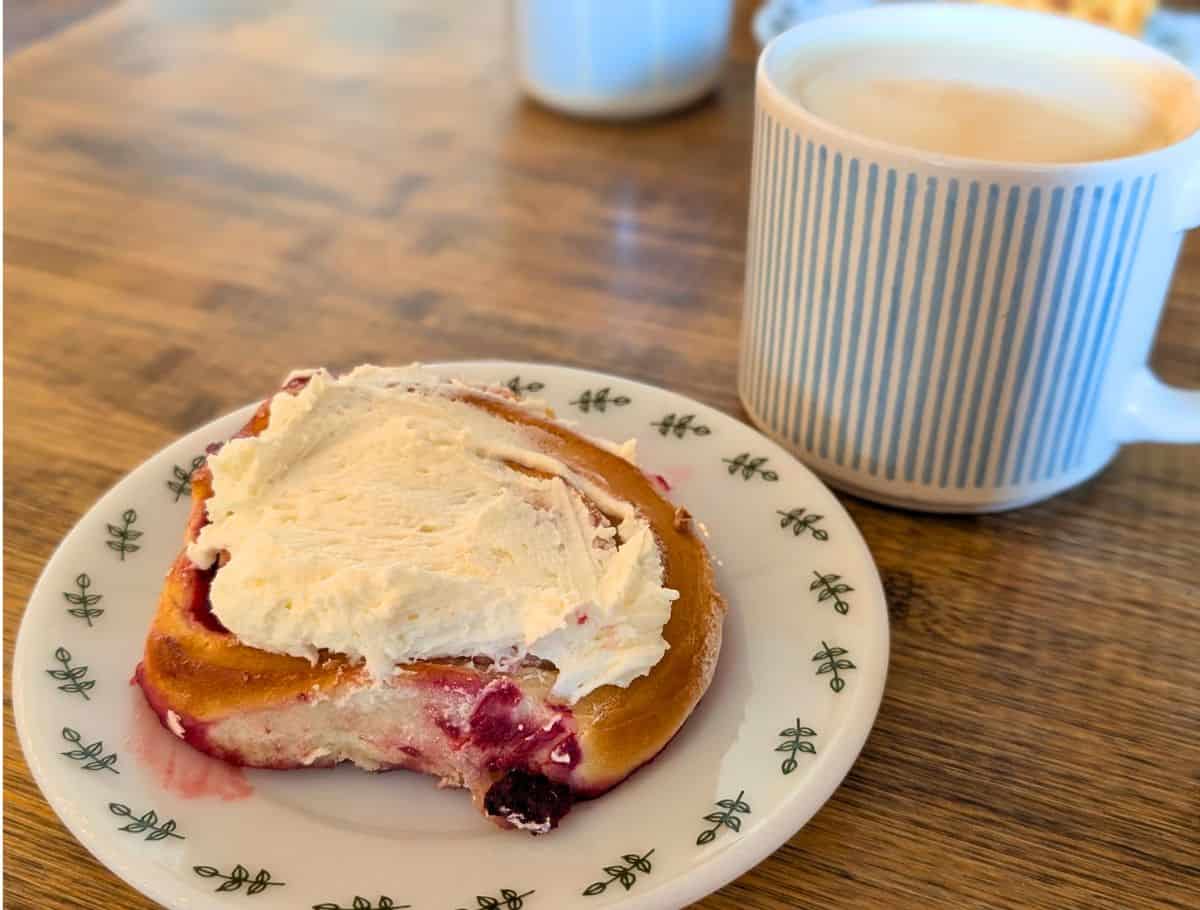 Raspberry Roll from The Willow Bakery & Cafe with cup of coffee