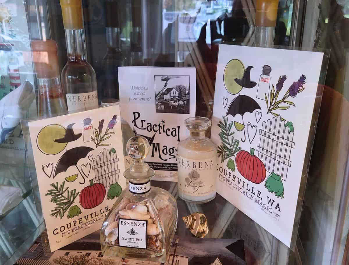 display of practical magic cards and bottles